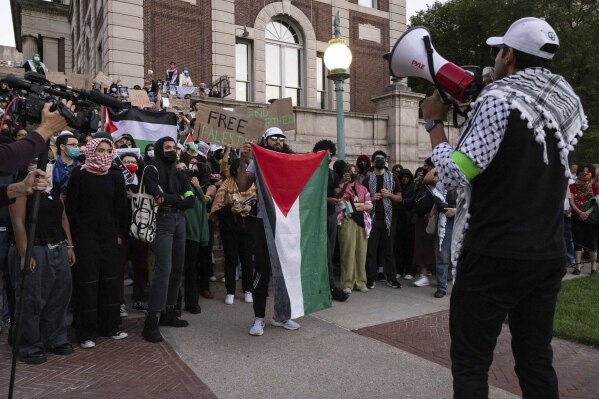 FILE - Pro-Palestinian demonstrators gather for a protest at Columbia University, Thursday, Oct. 12, 2023, in New York. The federal government has opened civil rights investigations at seven schools and universities over allegations of antisemitism or Islamophobia since the outbreak of the Israel-Hamas war. I(AP Photo/Yuki Iwamura, File)