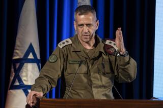 FILE - IDF Chief of Staff Aviv Kochavi speaks during a candle lightning ceremony with Israeli soldiers on the Jewish holiday of Hanukkah, in Jerusalem, on Nov. 29, 2021. Israel's military chief of staff strongly suggested on Wednesday, Dec. 14, 2022, that Israel was behind a strike on a truck convoy in Syria last month, giving a rare glimpse of Israel's shadow war against Iran and its proxies across the region. Lt. Gen. Aviv Kochavi said Israeli military and intelligence capabilities made it possible to strike specific targets that pose a threat. He used a November strike on the convoy as an example.(AP Photo/Tsafrir Abayov)
