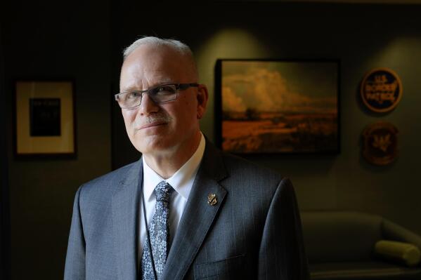 FILE - U.S. Customs and Border Protection Commissioner Chris Magnus poses for a photograph during an interview in his office with The Associated Press, Feb. 8, 2022, in Washington. (AP Photo/Patrick Semansky, File)