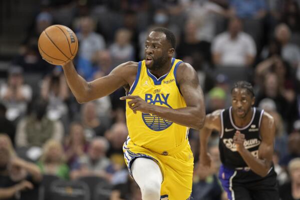 Golden State Warriors forward Draymond Green (23) starts a fast break during the first quarter of the team's NBA basketball game against the Sacramento Kings in Sacramento, Calif., Sunday, April 3, 2022. (AP Photo/José Luis Villegas)