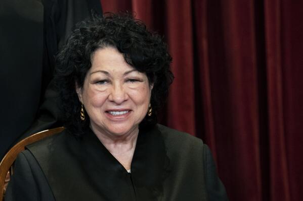 FILE - In this April 23, 2021, file photo Associate Justice Sonia Sotomayor sits during a group photo at the Supreme Court in Washington. Acknowledging the limits of her own influence on the law as a member of the Supreme Court's liberal minority, Sotomayor on Wednesday, Sept. 29, encouraged citizens to work to change laws they may disagree with, like a recent Texas law that limits access to abortions. (Erin Schaff/The New York Times via AP, Pool, File)