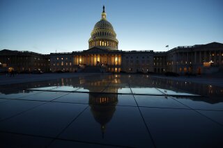 FILE - This March 5, 2018, file photo show the East Front of the U.S. Capitol at sunset in Washington. Just two months before the midterm elections, bipartisan legislation to try to prevent foreign hacking into U.S. election systems is stalled in Congress as the White House and some Republicans worry it could exert too much federal control over the states. Supporters of the bill say the delay could embolden Russia, which targeted election infrastructure in at least 21 states in 2016. (AP Photo/Alex Brandon, File)