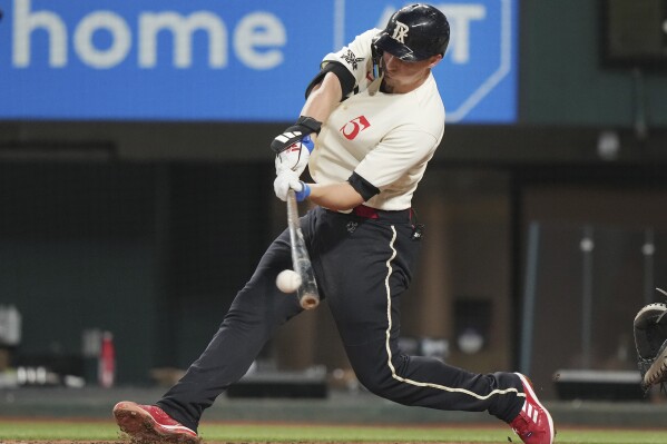 Carlos Santana of the Milwaukee Brewers hits a home run against