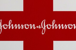 FILE - A Johnson & Johnson logo on the exterior of a first aid kit in Walpole, Mass., Feb. 24, 2021. South Africa-Johnson & Johnson-Investigation. U.S.-based pharmaceuticals company Johnson & Johnson is being investigated in South Africa for allegedly charging “excessive” prices for a key tuberculosis drug. The government-appointed commission that regulates business practices in the country announced the investigation on Friday, Sept. 15, 2023. (AP Photo/Steven Senne, File)