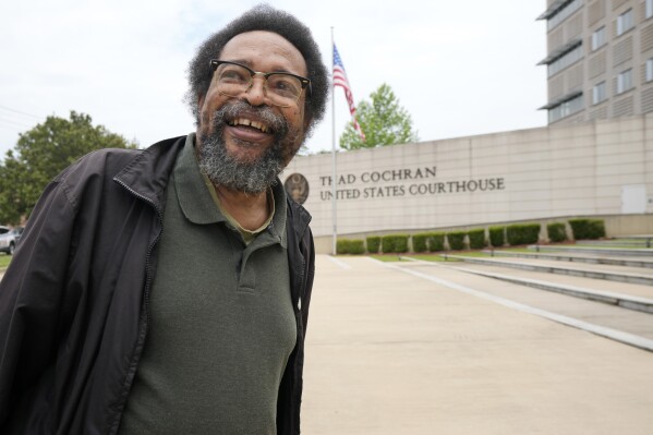 FILE - Civil rights activist and Jackson resident Frank Figgers prepares to enter the Thad Cochran U.S. Courthouse in Jackson, Miss., Monday, May 22, 2023. Figgers opposes a Mississippi law that would create a court in part of Jackson with a judge and prosecutors who would be appointed rather than elected. (AP Photo/Rogelio V. Solis, File)