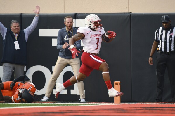South Alabama running back La'Damian Webb (3) runs for a touchdown against Oklahoma State during the second quarter of an NCAA college football game Saturday, Sept. 16, 2023, in Stillwater, Okla. (AP Photo/Brody Schmidt)