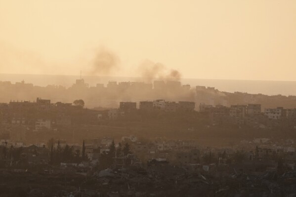 Smoke rises following an Israeli army bombardment in Gaza Strip, seen from southern Israel, Tuesday, May 20, 2025. (AP Photo/Maya Alleruzzo)