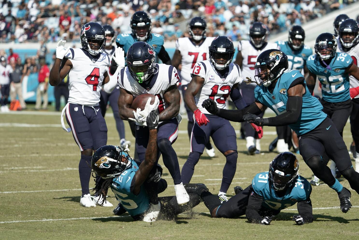 Pierce's run, Walker's gaffe help Texans topple Jags again