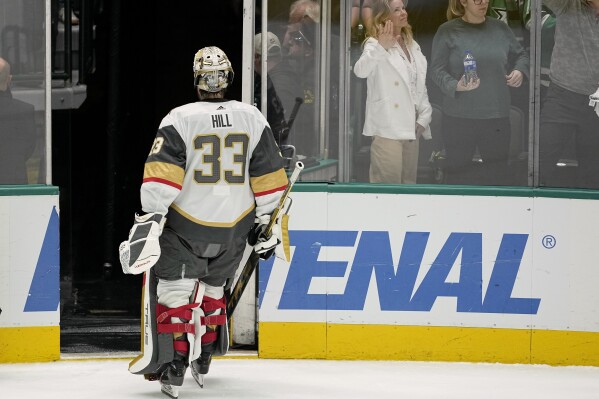 Vegas Golden Knights goaltender Adin Hill (33) leaves the ice after the team's 3-2 loss to the Dallas Stars in Game 5 of an NHL hockey Stanley Cup first-round playoff series in Dallas, Wednesday, May 1, 2024. (AP Photo/Tony Gutierrez)