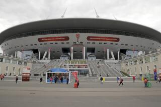 FILE - A general view of the St. Petersburg Stadium prior to the Confederations Cup soccer match between New Zealand and Portugal, in St. Petersburg, Russia, June 24, 2017. The British government led calls Tuesday, Feb. 22, 2022 for the Champions League final to be taken off Russia by European football's governing body to punish its deepening intervention in Ukraine. The showpiece men's game is due to be played in St. Petersburg on May 28 for the biggest sporting event in Russia since the 2018 World Cup.(AP Photo/Pavel Golovkin, file)