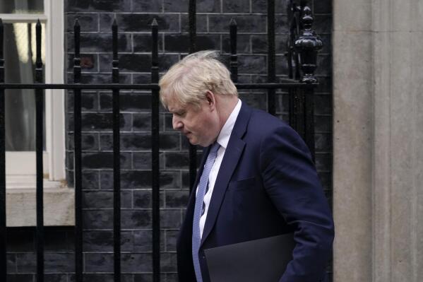 Britain's Prime Minister Boris Johnson leaves 10 Downing Street as he makes his way to the House of Commons, in London, Monday, Jan. 31, 2022. An investigation says lockdown-breaching parties by Prime Minister Boris Johnson and his staff represent a “serious failure” to observe the standards expected of government. (AP Photo/Alberto Pezzali)