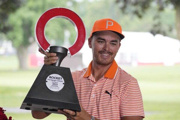 Stickers adorn Rickie Fowler's ever-present water bottle at US Open