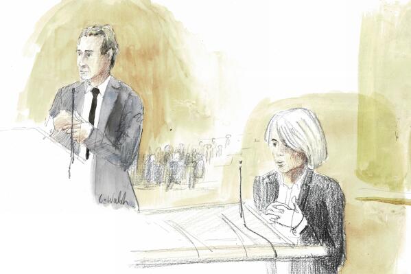 This courtroom sketch by Cynthia Walsh shows CEO of Air France Anne Rigail, right, and Airbus CEO Guillaume Faury, left, during the first day of the trial of Airbus and Air France companies, at the Paris courthouse, in Paris, Monday, Oct. 10 , 2022. Airbus and Air France go on trial on manslaughter charges Monday over the crash of a Rio-Paris flight in 2009 that plunged into the Atlantic amid thunderstorms. The accident kiled all 228 people aboard and led to changes in air safety regulations. (AP Photo/Cynthia Walsh)