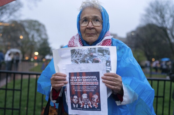 A protestor attends a demonstration in support of Palestinians, Tuesday, April 2, 2024, at Lafayette Park across from the White House in Washington,. (AP Photo/Jose Luis Magana)