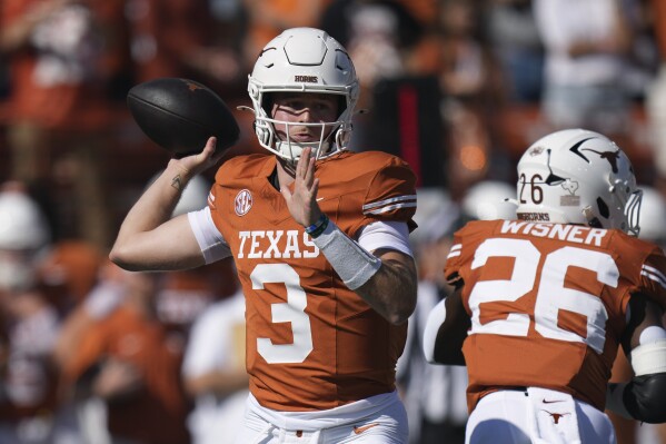 Texas quarterback Quinn Ewers (3) throws against Florida during the first half of an NCAA college football game in Austin, Texas, Saturday, Nov. 9, 2024. (AP Photo/Eric Gay)