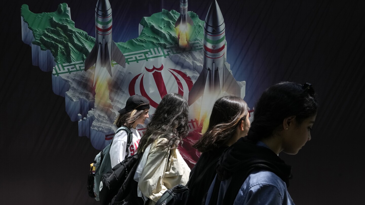 Iran fires air defenses at Isfahan base and nuclear site after drones spotted