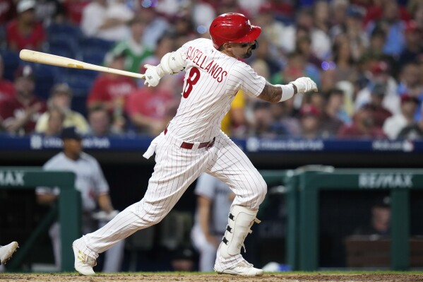 Stott, Realmuto, Rojas homer for NL wild card-leading Phillies in 13-2 win  over Twins