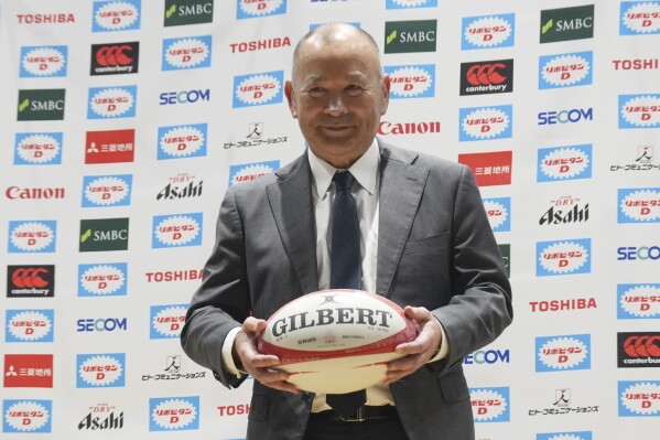 Eddie Jones of Australia poses for photographers during a news conference Thursday, Dec. 14, 2023, in Tokyo. Jones was named as new coach of the Japan national rugby team on Wednesday. (AP Photo/Eugene Hoshiko)