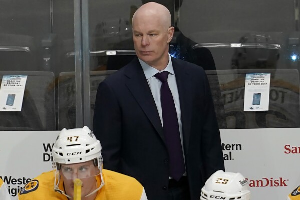FILE - Nashville Predators head coach John Hynes watches against the San Jose Sharks during an NHL hockey game in San Jose, Calif., Saturday, March 5, 2022. The Minnesota Wild fired coach Dean Evason and replaced him with Hynes, Monday, Nov. 27, 2023, after losing seven straight games and 14 of their first 19 to start to the NHL season. (AP Photo/Jeff Chiu, File)