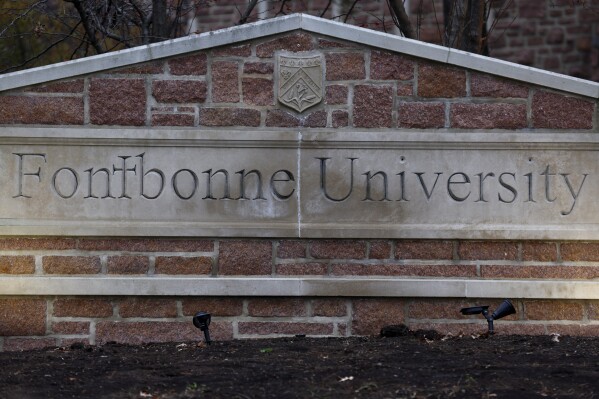 A sign for Fontbonne University is displayed Thursday, Nov. 30, 2023, at its campus in Clayton, a suburb of St. Louis. The 100-year-old university in Missouri will shut down next year, its president said Monday, March 11, 2024, citing declining enrollment and ongoing budget problems that made it impossible to keep going. (Christine Tannous/St. Louis Post-Dispatch via AP)