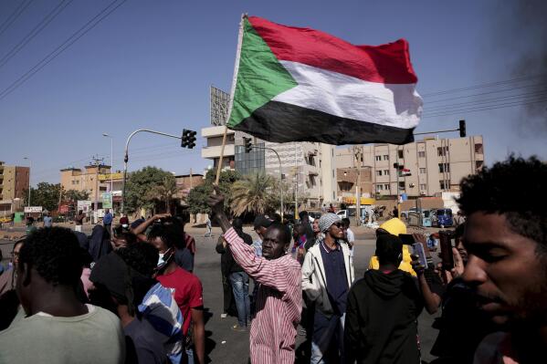 People chant slogans during a demonstration against the killing of dozens by Sudanese security forces since the Oct. 25, 2021 military takeover, in Khartoum, Sudan, Thursday, Jan. 20, 2022. (AP Photo/Marwan Ali)