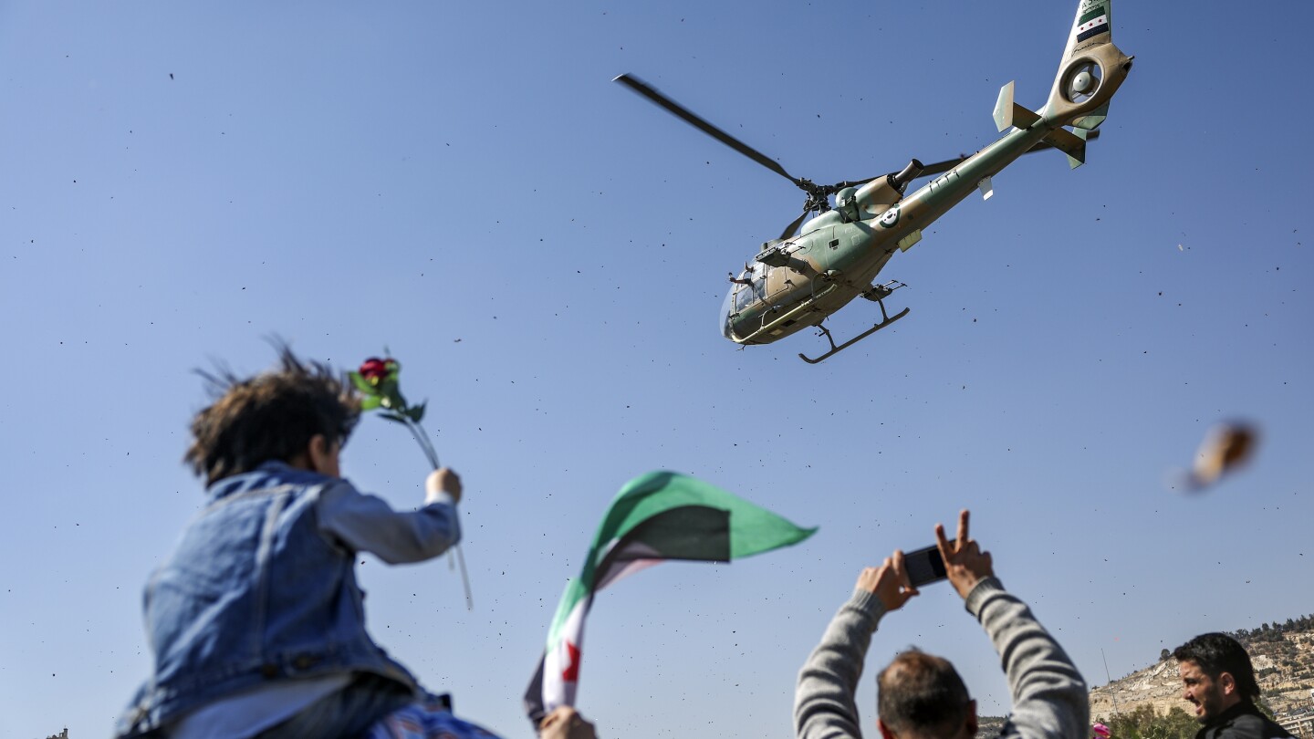 Syrians mark 14th anniversary of civil war uprising by celebrating the ouster of Bashar Assad