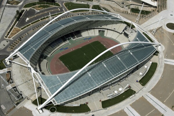 FILE - The Olympic stadium is seen from above in Athens, Greece on April 19, 2006. Government officials say Monday, Oct. 2, 2023 a new inspection has been ordered at a stadium that hosted the Athens Olympics in 2004 after rust was found along the iconic arched roof, forcing the site to close. The arched roof structures were designed by renowned Spanish architect Santiago Calatrava for the 2004 Athens Olympics. (AP Photo/Thanassis Stavrakis, File)