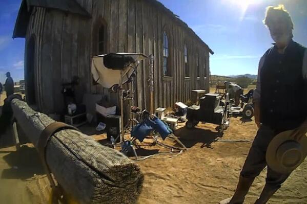 FILE - In this image from video released by the Santa Fe County Sheriff's Office, Alec Baldwin speaks with investigators following a fatal shooting on a movie set in Santa Fe, N.M. No one is objecting to a settlement agreement to resolve allegations of workplace safety violations in the 2021 shooting death of a cinematographer by Alec Baldwin on the set of a Western movie. (Santa Fe County Sheriff's Office via AP, File)