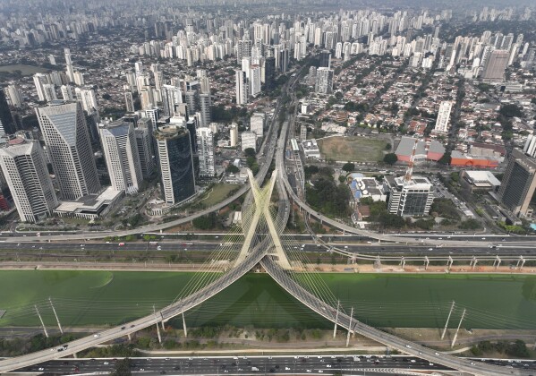 Drought is making Sao Paulo’s river emerald inexperienced whilst smoke turns its skies gray