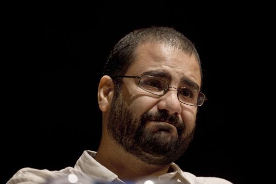 FILE - Egypt's leading pro-democracy activist Alaa Abdel-Fattah speaks during a conference at the American University in Cairo, Egypt, Sept. 22, 2014.  The family of the imprisoned Egyptian activist says that they have seen him on Thursday, Nov. 17, 2022,  and that his condition has “deteriorated severely." (AP Photo/Nariman El-Mofty, File)