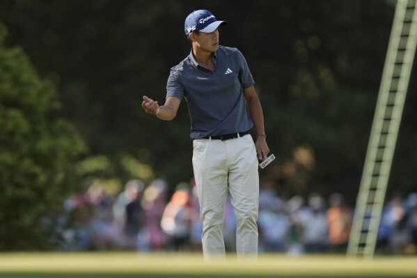 Collin Morikawa reacts after missing a putt on the 10th hole during final round at the Masters golf tournament at Augusta National Golf Club Sunday, April 14, 2024, in Augusta, Ga. (AP Photo/Charlie Riedel)