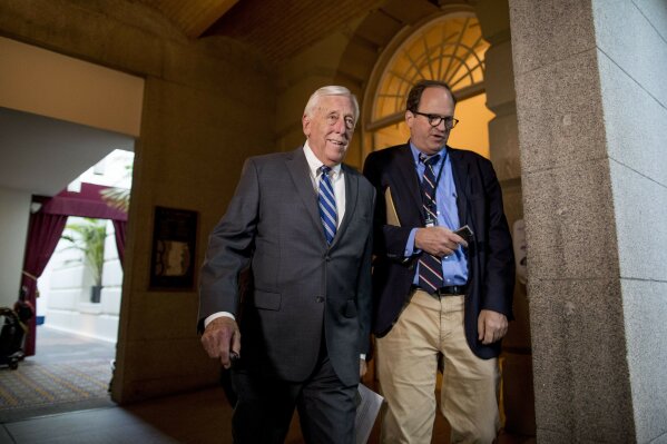 House Majority Leader Steny Hoyer of Md., left, arrives for a House Democratic caucus meeting on Capitol Hill in Washington, Wednesday, July 10, 2019. (AP Photo/Andrew Harnik)