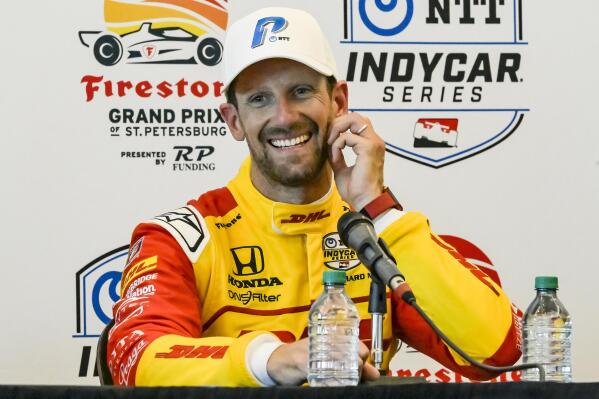 Andretti Motorsport driver Romain Grosjean talks to reporters in the media center after winning the pole position during qualifying for the Grand Prix of St. Petersburg auto race Saturday, March 4, 2023, in St. Petersburg, Fla. (AP Photo/Steve Nesius)