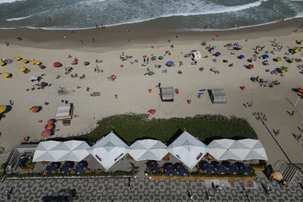 A beach kiosk sits on the Ipanema Beach boardwalk in Rio de Janeiro, Sunday, May 25, 2025. (AP Photo/Bruna Prado)