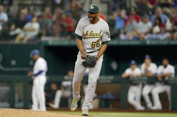 Rangers' bats come alive in win over Athletics