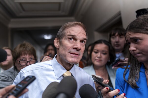 Rep. Jim Jordan, R-Ohio, chairman of the House Judiciary Committee and a staunch ally of former President Donald Trump, talks with reporters as House Republicans meet again behind closed doors to find a path to elect a new speaker after House Majority Leader Steve Scalise, R-La., dropped out of the race Thursday night, at the Capitol in Washington, Friday, Oct. 13, 2023. (AP Photo/J. Scott Applewhite)