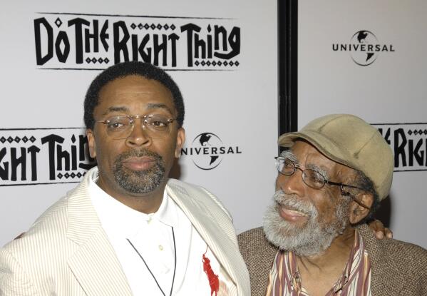 FILE - Director Spike Lee, left, and his father Bill Lee attend a special 20th anniversary screening of "Do the Right Thing", in New York, on June 29, 2009. Bill Lee, a well-regarded jazz musician who accompanied such artists as Bob Dylan, Simon and Garfunkel and Harry Belafonte as well as scoring four of his son Spike’s early films, died Wednesday, May 24, 2023, according to Theo Dumont, a publicist for Spike Lee. He was 94. (AP Photo/Peter Kramer, File)
