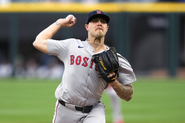 Boston Red Sox starting pitcher Tanner Houck delivers during the first inning of the team's baseball game against the Chicago White Sox on Thursday, June 6, 2024, in Chicago. (AP Photo/Charles Rex Arbogast)