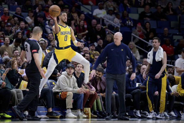 Pelicans tie franchise record with 48-point 1st quarter, rout Pacers  129-102