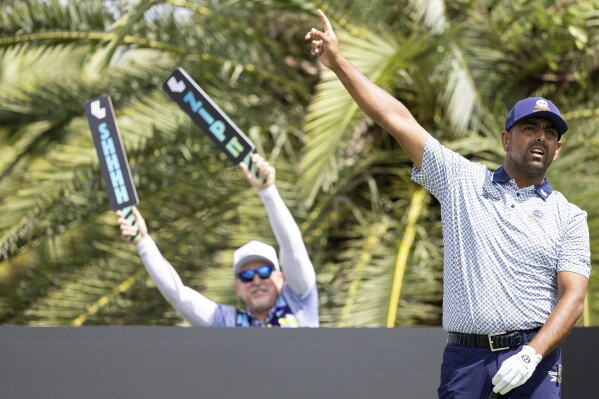 Anirban Lahiri of Crushers GC signal fore on the sixth tee during the second round of LIV Golf tournament at Trump National Doral, Saturday, April 5, 2025 in Miami. (Jon Ferrey/LIV Golf via AP)