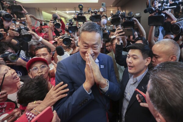 Pheu Thai political party's Srettha Thavisin reacts as he attends a press conference after Thailand's parliament voted in favor of his prime ministerial candidacy, at the party headquarters in Bangkok, Thailand, Tuesday, August 22, 2023. (AP Photo/Wason Wanichakorn)