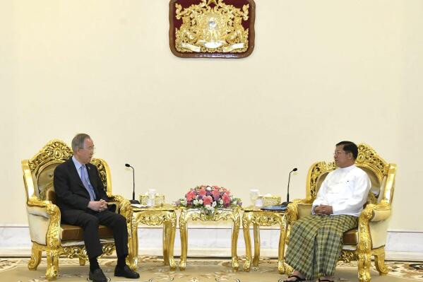 In this photo provided by the Myanmar Military True News Information Team, Senior Gen. Min Aung Hlaing, right, head of the military council, talks with Ban Ki Moon, left, former U.N Secretary-General, during their meeting Monday, April 24, 2023, in Naypyitaw, Myanmar. (Military True News Information Team via AP)