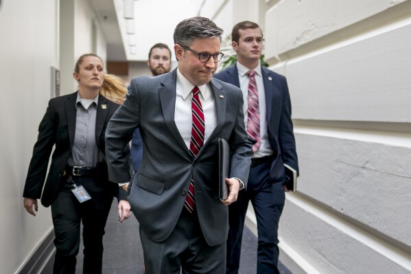 Speaker of the House Mike Johnson, R-La., arrives for a closed-door GOP caucus meeting, at the Capitol in Washington, Wednesday, Feb. 14, 2024. (AP Photo/J. Scott Applewhite)