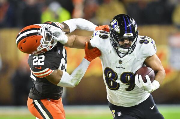Cleveland Browns safety Grant Delpit tries to stop Baltimore Ravens tight end Mark Andrews (89) during the first half of an NFL football game, Saturday, Dec. 17, 2022, in Cleveland. (AP Photo/David Richard)