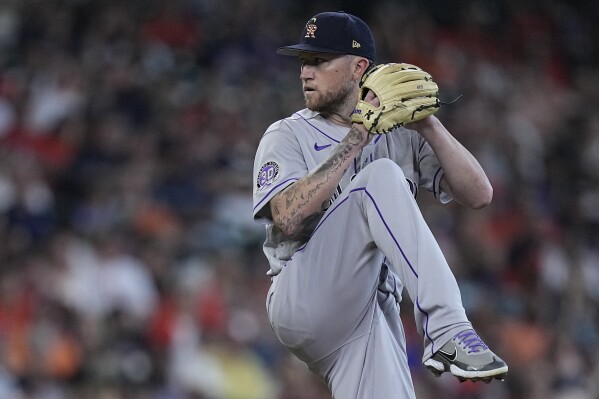Abad picks up his first win in six years. Rockies beat Astros 4-3 as  bullpen shines