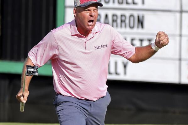Dicky Pride reacts after sinking his par putt on the 18th hole to win the PGA Tour Champions’ Mitsubishi Electric Classic golf tournament at TPC Sugarloaf on Sunday, May 16, 2021, in Duluth, Ga. (Curtis Compton/Atlanta Journal-Constitution via AP)