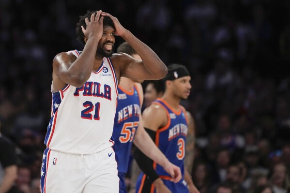 Philadelphia 76ers' Joel Embiid (21) reacts after a turnover during the second half of Game 5 in an NBA basketball first-round playoff series against the New York Knicks, Tuesday, April 30, 2024, in New York. (AP Photo/Frank Franklin II)