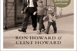 This image released by William Morrow shows cover art for the upcoming memoir "The Boys: A Memoir of Hollywood and Family" by Ron Howard and Clint Howard. It's scheduled to come out Oct. 12. (William Morrow via AP)