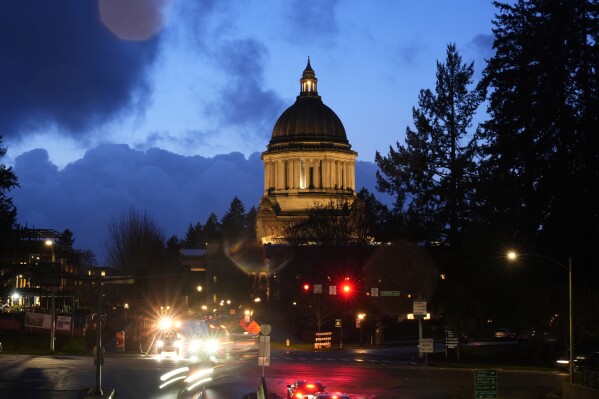 FILE - The Washington state Capitol building is pictured, Tuesday, Jan. 9, 2024, in Olympia, Wash. A new Washington state parental rights law derided by critics as a "forced outing" measure will be allowed to take effect this week after a court commissioner on Tuesday declined to issue an emergency order temporarily blocking it. (AP Photo/Lindsey Wasson, file)