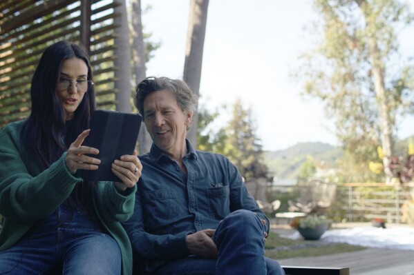 This image released by ABC News Studios shows Demi Moore, left, and Andrew McCarthy in a scene from the documentary "Brats." (ABC News Studios via AP)